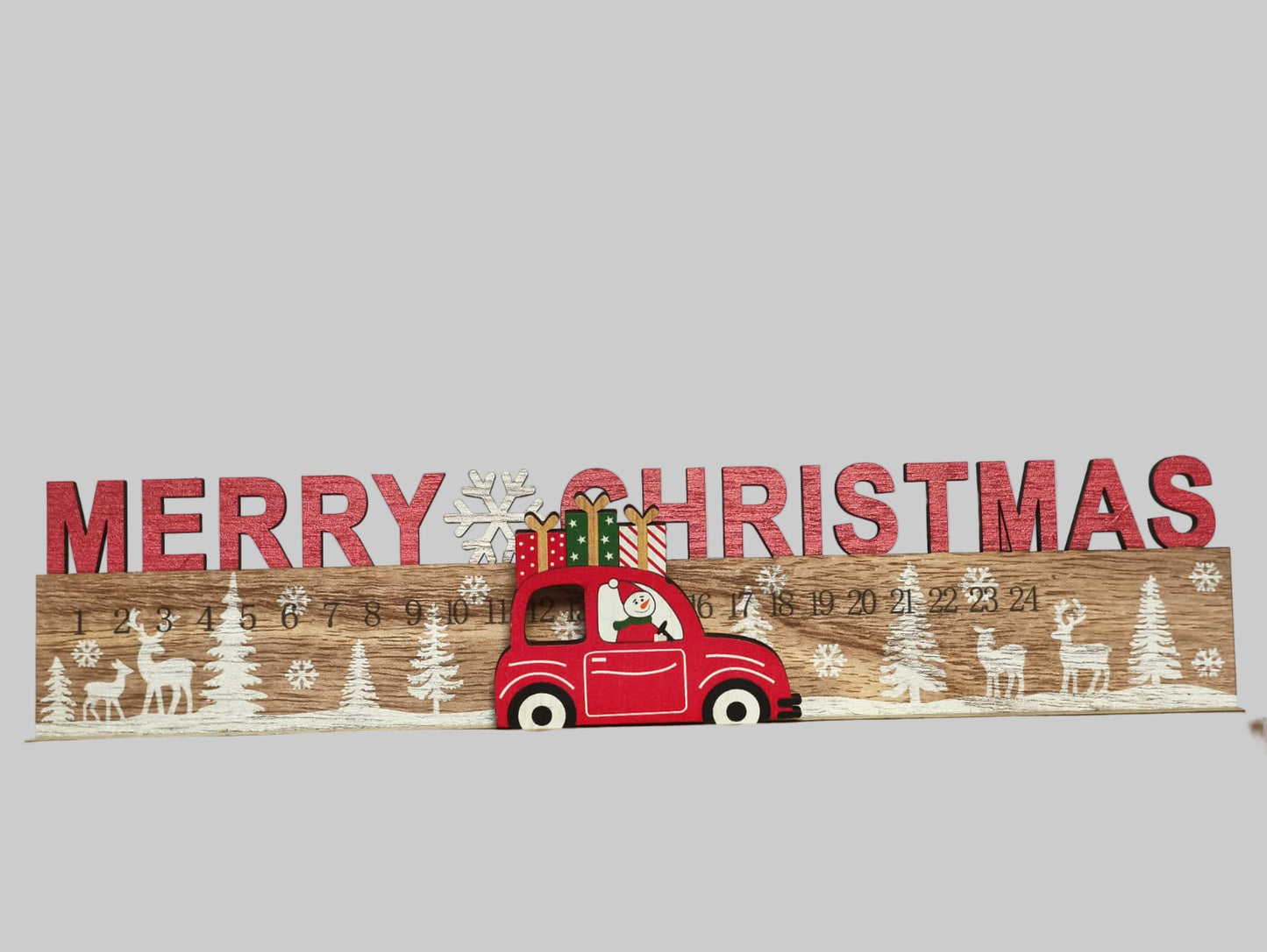 Calendario de navidad de madera con coche movible.